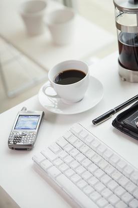 Drinking Coffee with Laptop